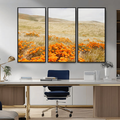 A golden field with vibrant orange poppies blooming across rolling hills under a soft, sunlit sky, creating a warm and rustic landscape.