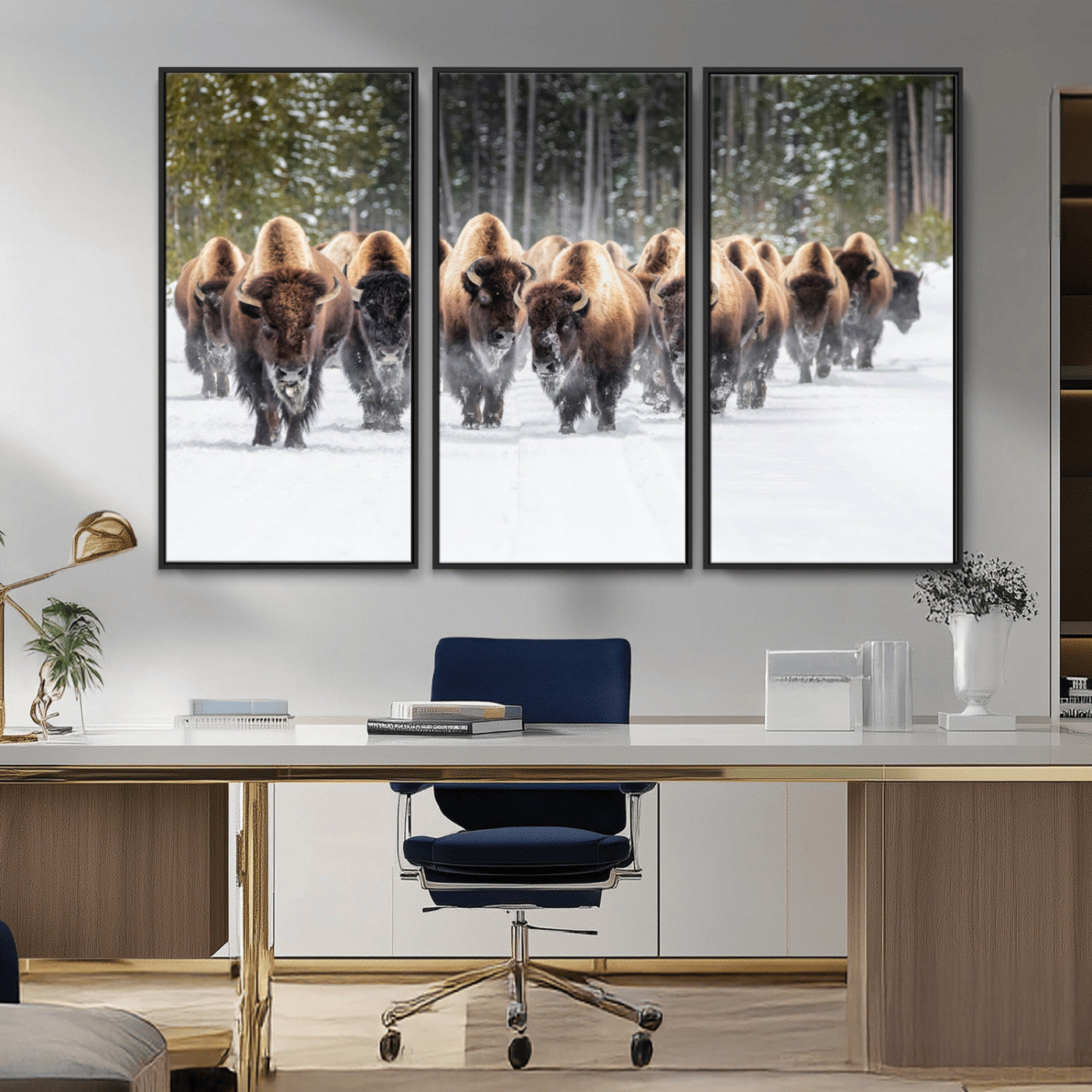 A herd of American bisons walking through a snowy forest path, perfect for rustic cabin or Western-themed wall decor.