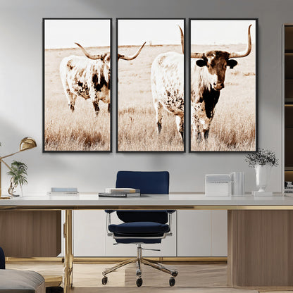 Two Texas longhorn cows standing in a sepia-toned pasture, evoking rustic charm perfect for farmhouse or western country interiors. (