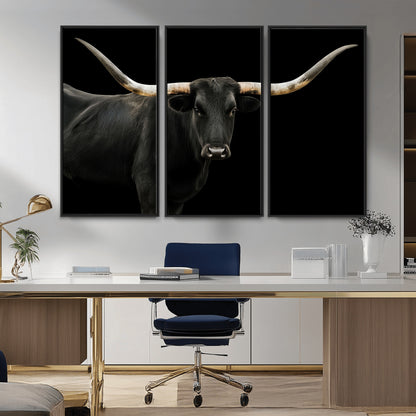 Close-up of a black Texas longhorn with large curved horns on black background, ideal for rustic farmhouse or modern western interiors.