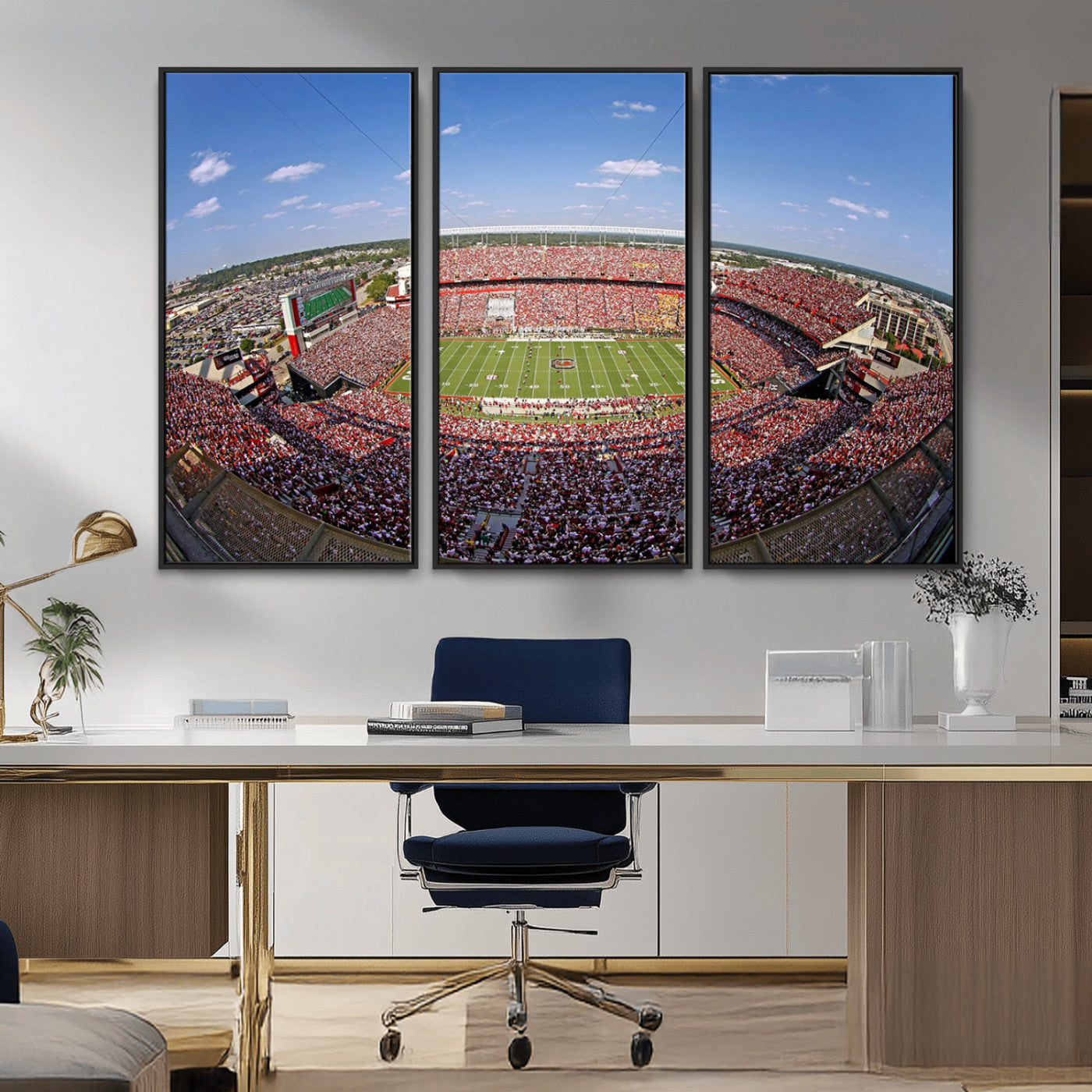 An William Brice-Stadium view of a full football stadium with cheering fans and clear blue skies, capturing the excitement and energy of the game.
