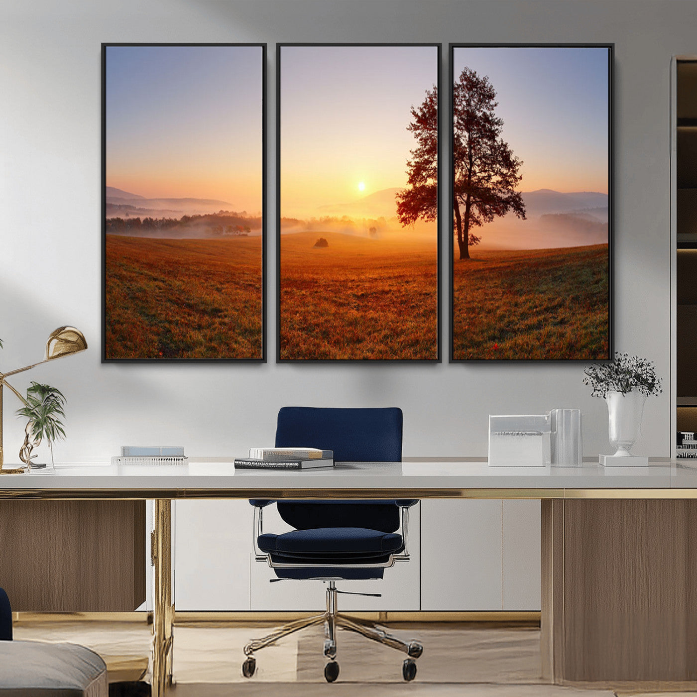 A tranquil landscape at sunrise with a mist-covered field and a lone tree, creating a peaceful and natural atmosphere.