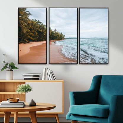 Framed canvas of a tropical beach with palm trees and soft waves, ideal for coastal escape or serene nature-inspired home decor.
