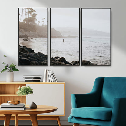 Framed canvas of a surfer in misty coastal tones at a foggy California beach, ideal for minimalist coastal beach or serene ocean-themed decor.
