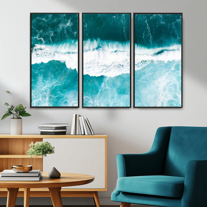 Aerial view of turquoise ocean waves crashing with white foam, perfect for tropical coastal or modern beach-style home decor.