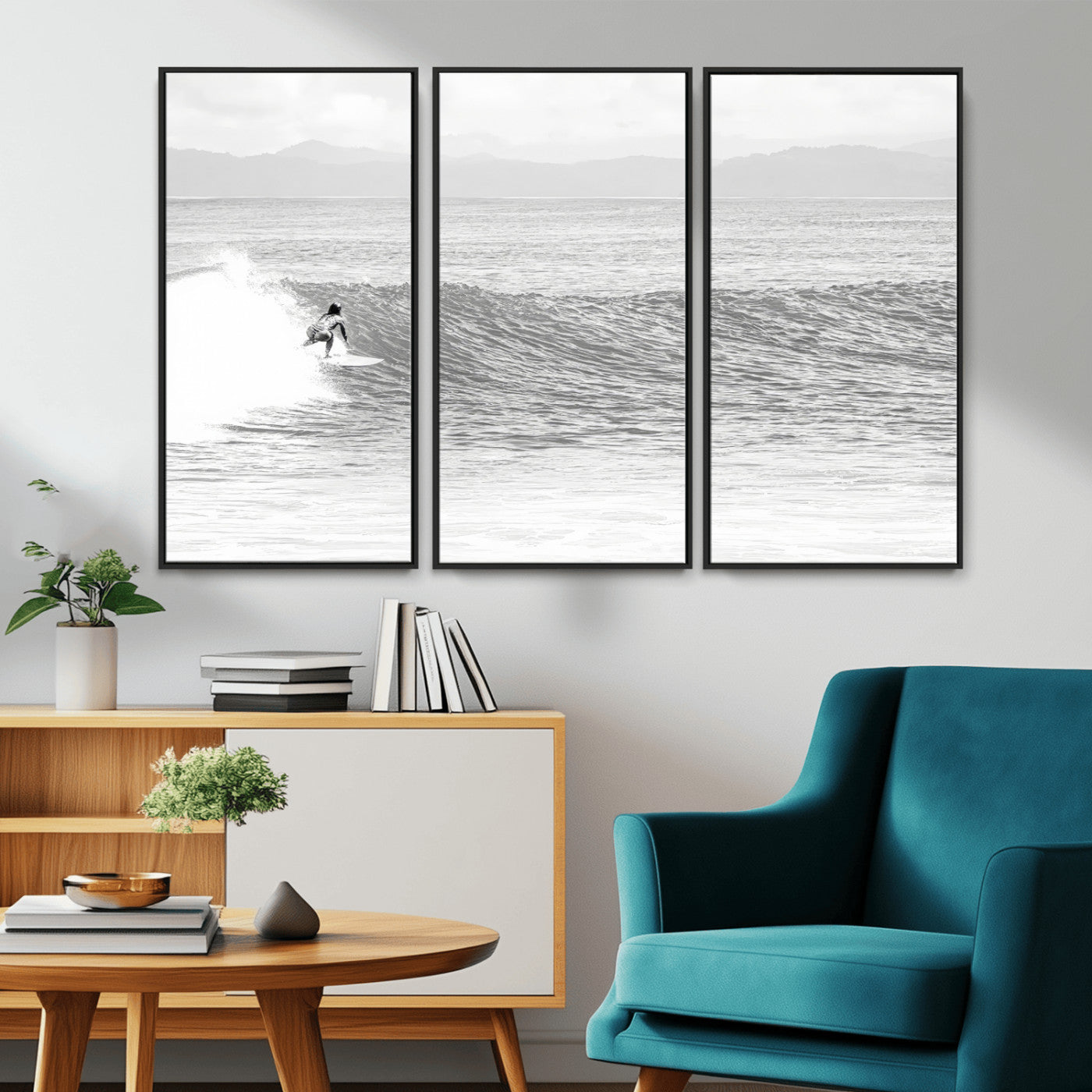 Monochrome photo of a surfer riding a wave with distant mountains, ideal for coastal motion or black and white surf-themed wall decor.