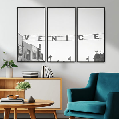 Black and white photo of Venice Beach sign and palm-lined street, perfect for urban coastal or minimalist LA-inspired wall decoration.