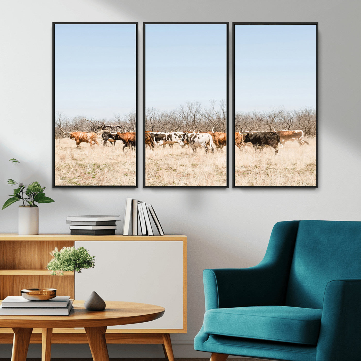 Framed wall art of Texas longhorn cattle walking through a dry, neutral-toned prairie, perfect for rustic farmhouse or western-themed home decor.