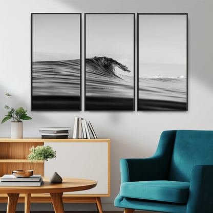 Striking black and white photo of a curling wave, ideal for modern coastal or minimalist wall decor settings.