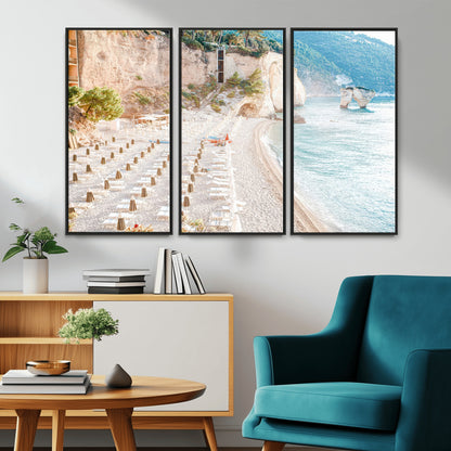 Wall art of a calm Mediterranean beach with rows of sun loungers and umbrellas in soft pastel tones, perfect for light coastal or vacation-themed decor.