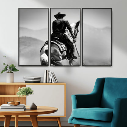 Black and white canvas of a cowboy on horseback with moody tones, perfect for rustic western or country-inspired home decor.