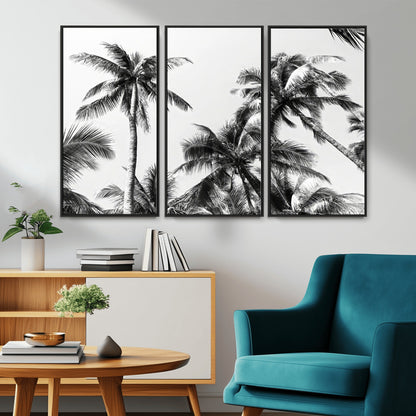 Black and white canvas of tall palm trees in moody tones, perfect for modern tropical minimalist or coastal-style home decor.