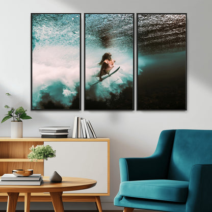 Vibrant underwater photo of a female surfer diving through turquoise waves, perfect for coastal boho or surf-inspired home decor.