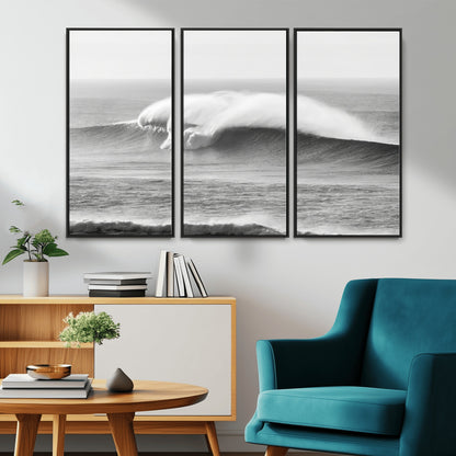 A dramatic black and white ocean wave crashing with immense force, capturing the raw power and movement of the sea in a bold seascape.