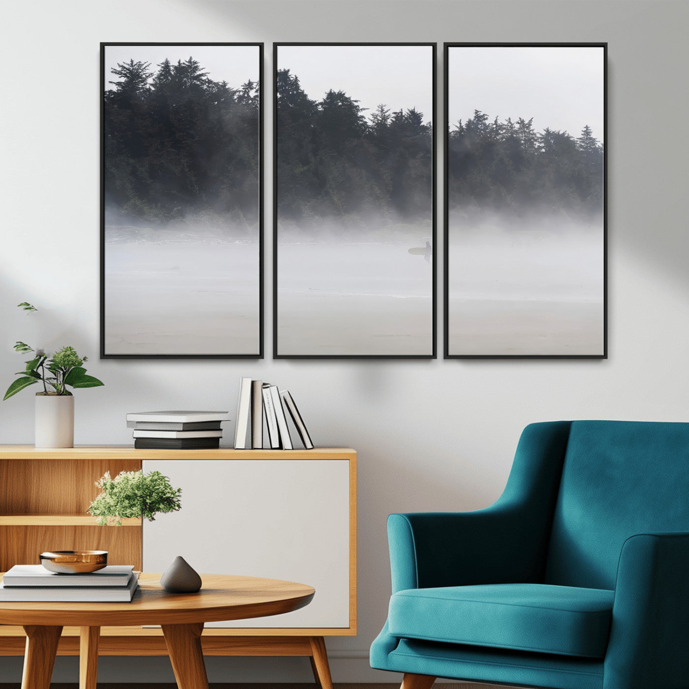 A lone surfer carrying a board through a misty shoreline, surrounded by dense trees and fog, creating a peaceful and mysterious coastal scene.