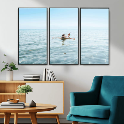 A peaceful minimalist scene of a person floating on crystal-clear water, surrounded by a vast open horizon, capturing relaxation and serenity in a tranquil aquatic setting.