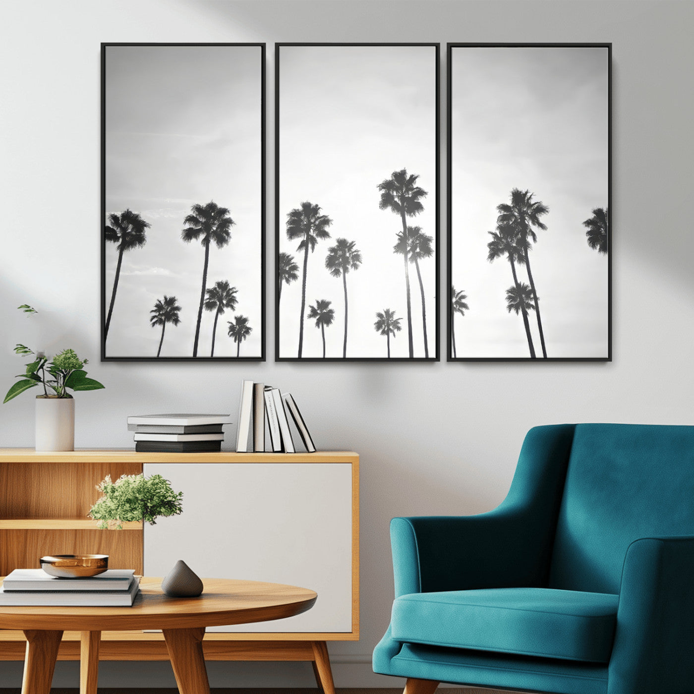 A black and white minimalist scene featuring tall palm trees silhouetted against a bright sky, creating a dreamy and timeless tropical aesthetic.