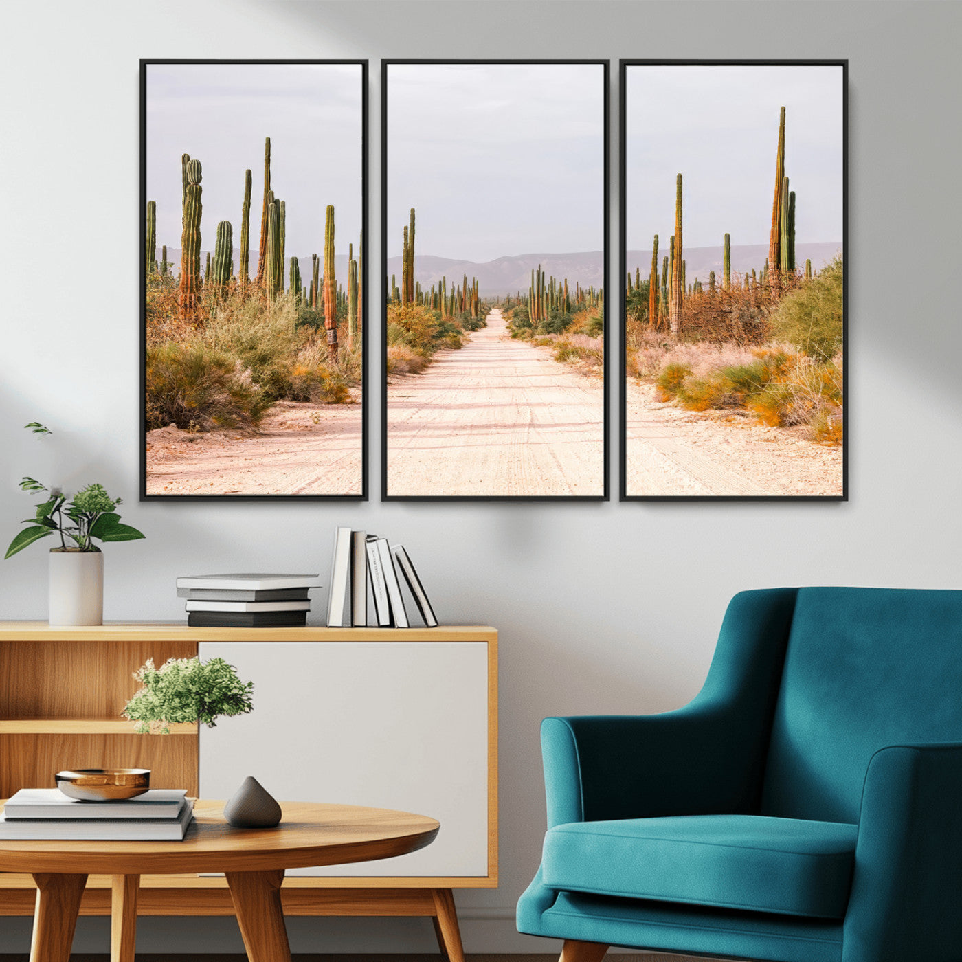 A desert road lined with saguaro cacti under a golden sky, creating a warm southwestern feel, perfect for boho or rustic decor.