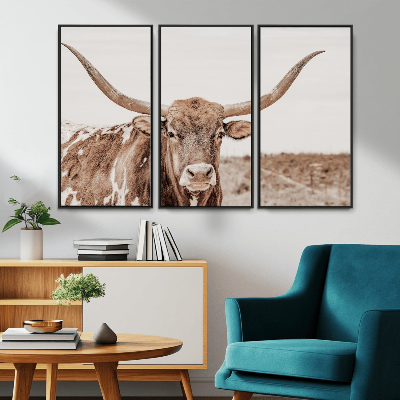 A longhorn cow in soft beige desert tones, standing calmly in open land, perfect for neutral western or rustic farmhouse interiors.