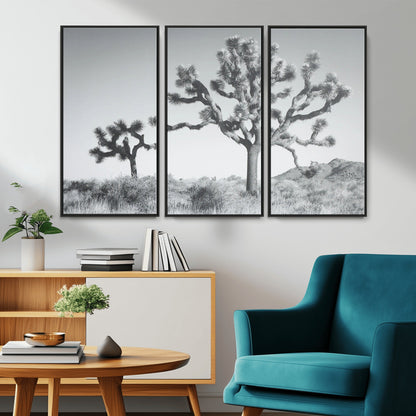 Black and white Joshua tree in a desert landscape with soft light and dry brush, perfect for rustic or minimalist home decor.