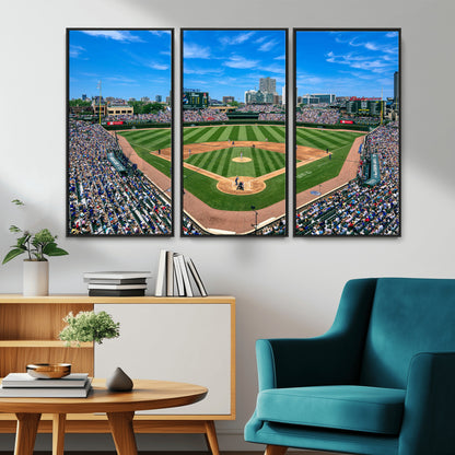 A wide-angle shot of a baseball field filled with spectators, with players on the field and the iconic Wrigley Field scoreboard in the background.