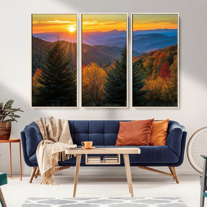 Vibrant sunset over autumn mountains with colorful trees and warm light, ideal for nature lovers or cabin-style wall decor.