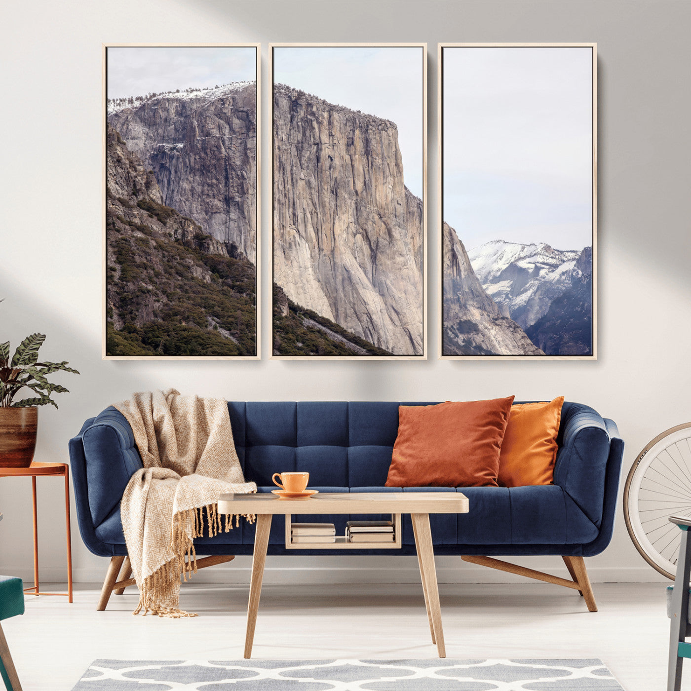 Framed canvas of El Capitan’s vertical granite face in Yosemite with snowy peaks, ideal for Sierra minimalism or mountain-inspired decor.