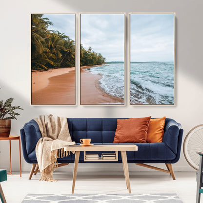 Framed canvas of a tropical beach with palm trees and soft waves, ideal for coastal escape or serene nature-inspired home decor.