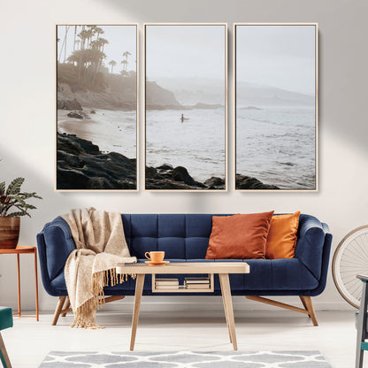 Framed canvas of a surfer in misty coastal tones at a foggy California beach, ideal for minimalist coastal beach or serene ocean-themed decor.