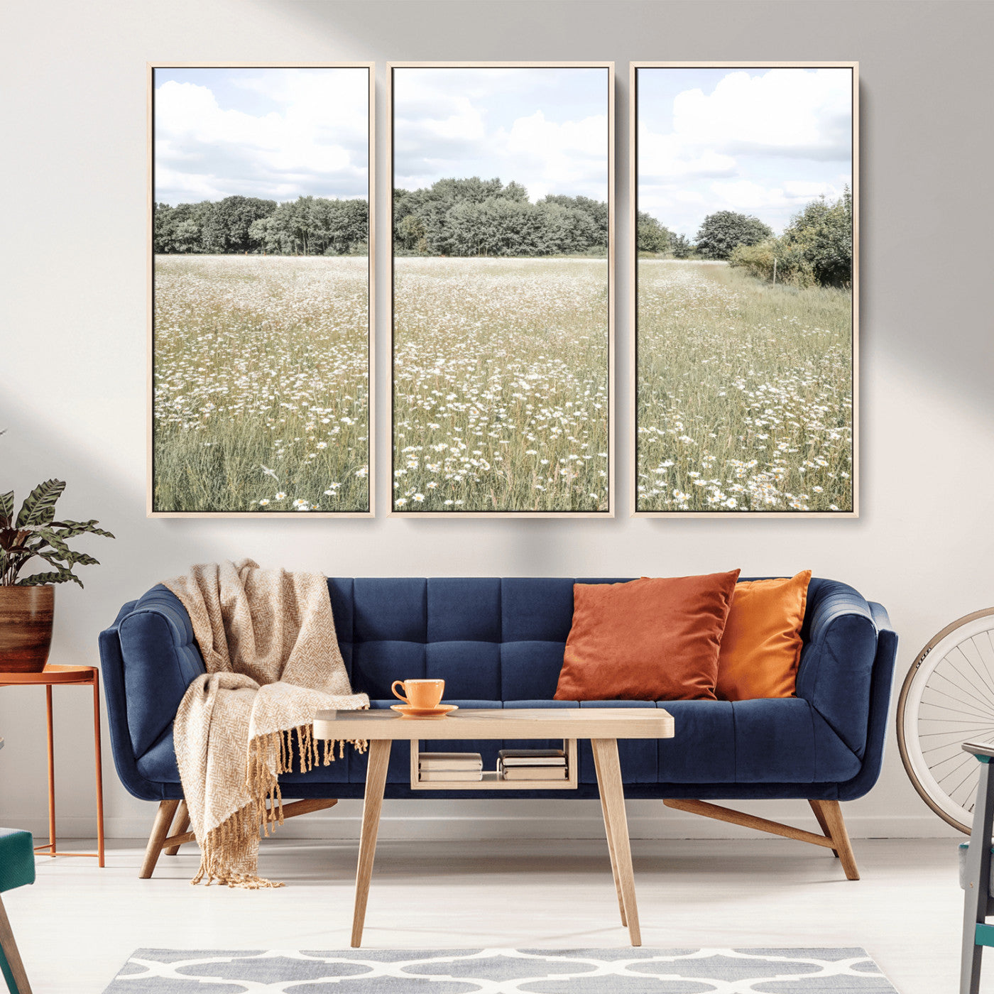 Soft-toned image of a wild daisy field under a cloudy sky, ideal for neutral or Scandinavian-inspired home decor.