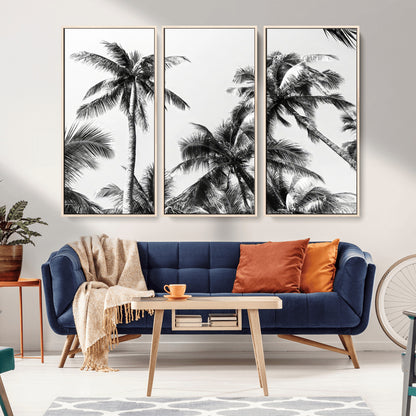 Black and white canvas of tall palm trees in moody tones, perfect for modern tropical minimalist or coastal-style home decor.