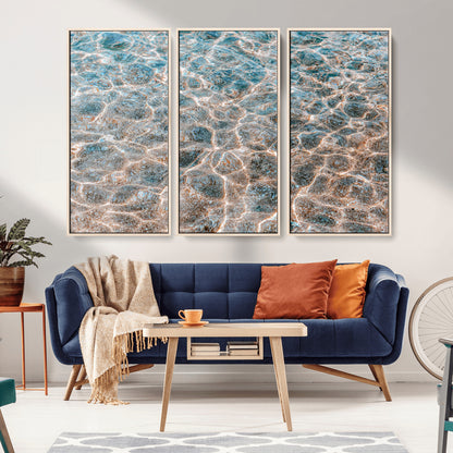 Close-up of sunlit ocean ripples with aqua blue and golden tones, ideal for modern coastal or minimalist home decor.