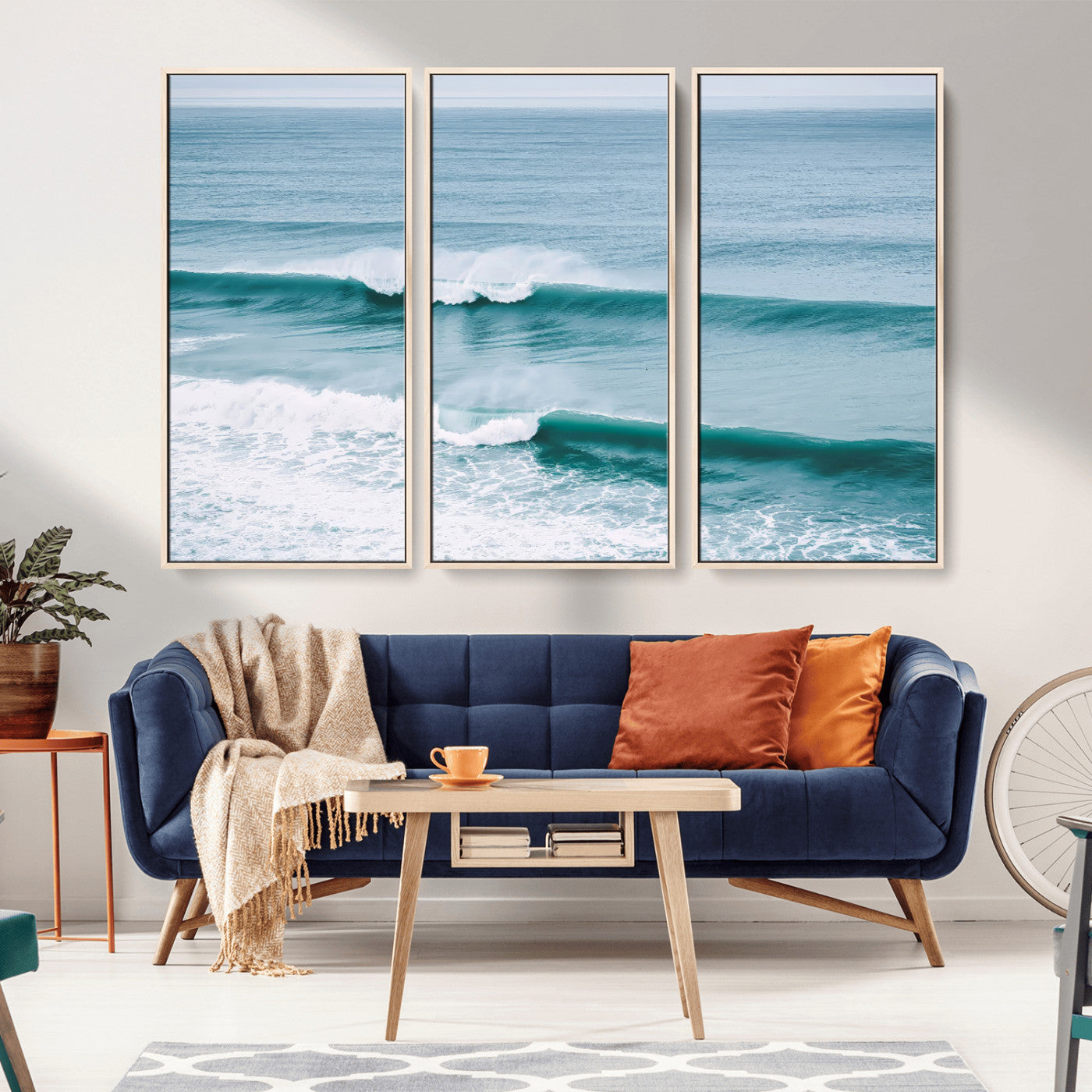 Powerful ocean waves rolling towards the shore, their turquoise hues blending with white sea foam under an open horizon, capturing the essence of the ocean's movement.