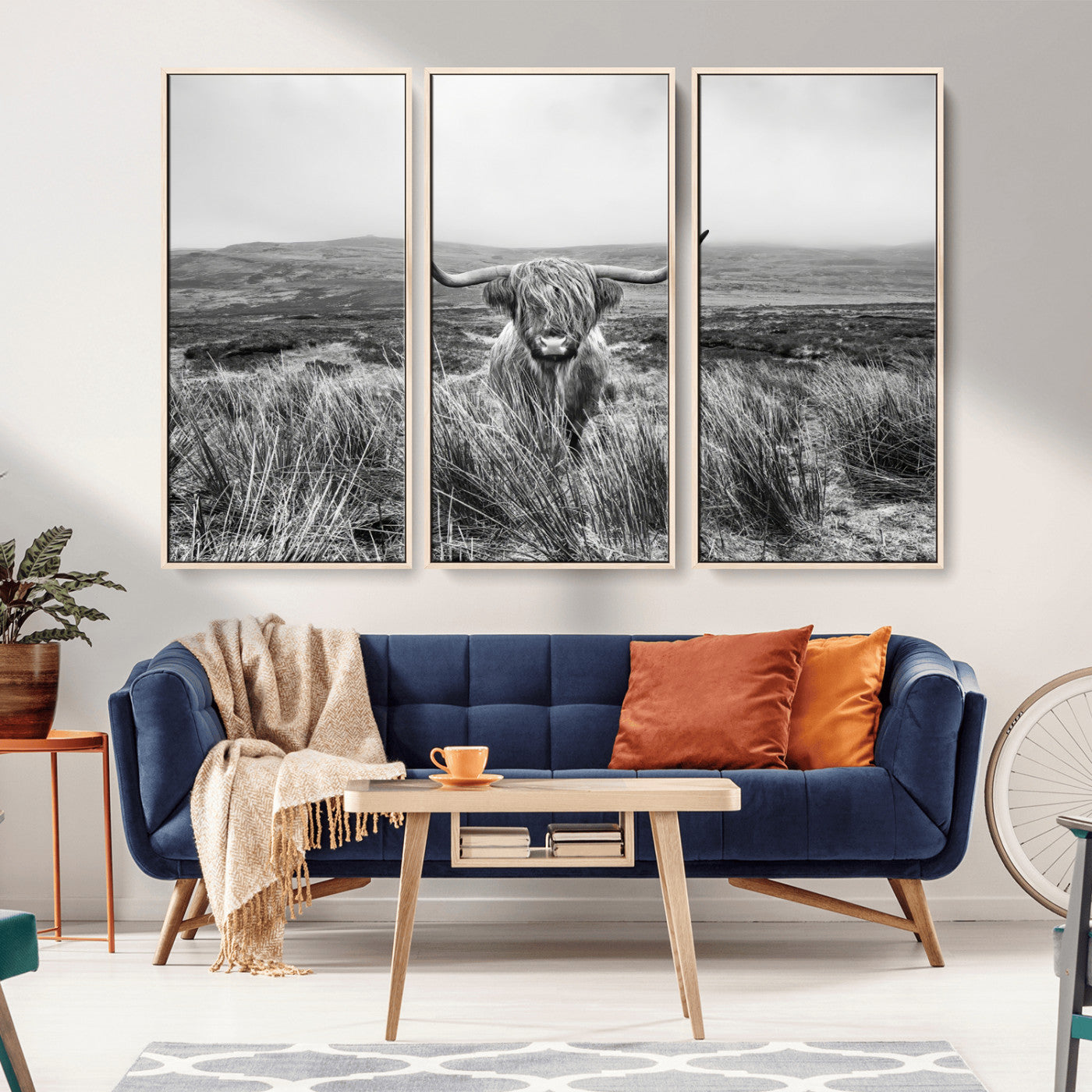 A black and white portrait of a Highland cow in a foggy Scottish countryside, capturing a rustic aesthetic and tranquil farm escape.