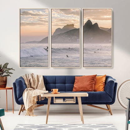 A surfer rides a golden hour wave near misty coastal mountains, surrounded by fellow surfers, capturing the spirit of a coastal adventure.