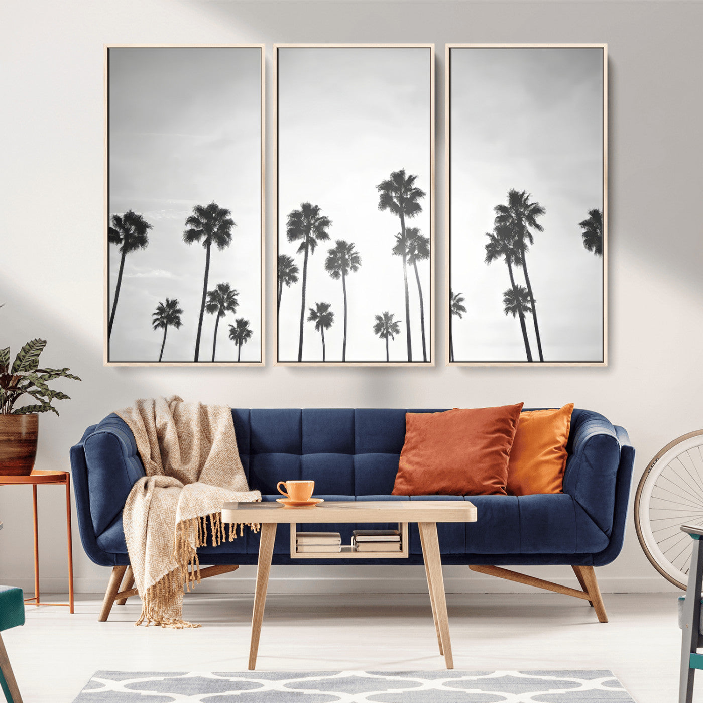 A black and white minimalist scene featuring tall palm trees silhouetted against a bright sky, creating a dreamy and timeless tropical aesthetic.