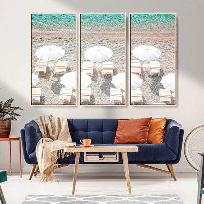 A bright beach scene with white umbrellas, pastel sand, and turquoise waters, creating a tranquil coastal vibe, perfect for beach house or summer decor.
