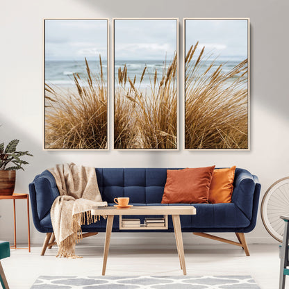 Canvas of golden beach grass swaying by the ocean under a soft cloudy sky, perfect for neutral-toned or coastal minimalist decor.