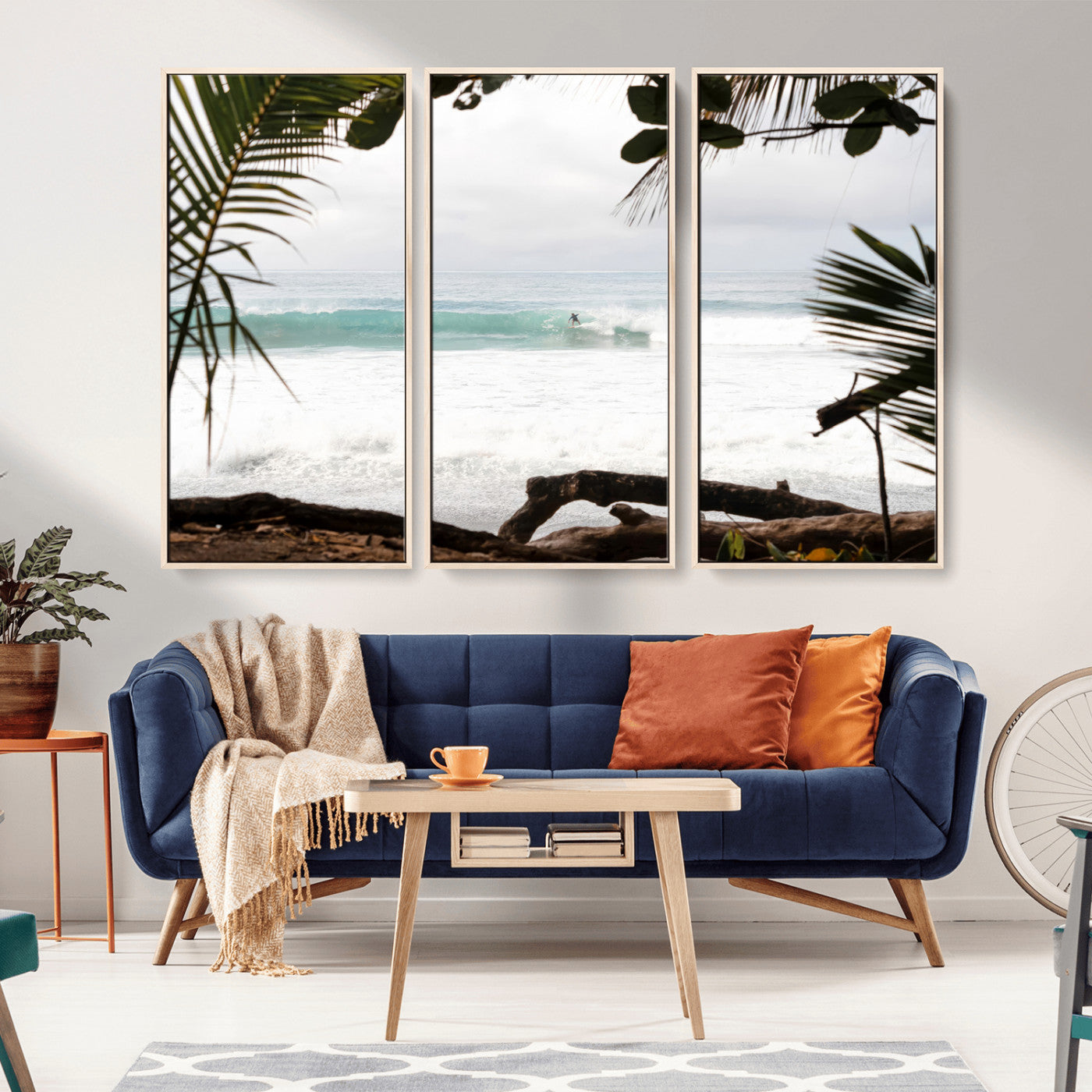 Tropical beach view with palm trees and surfer riding a wave, perfect for boho or coastal-inspired interior wall decor.