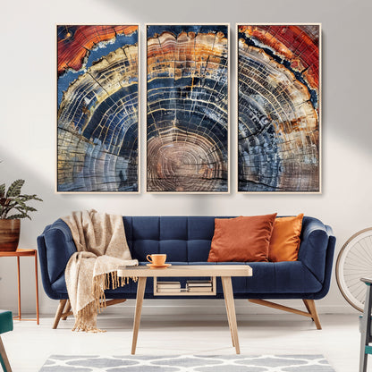 Vibrant tree ring with orange, brown, and blue tones in abstract detail, perfect for rustic or boho-inspired wall decor.