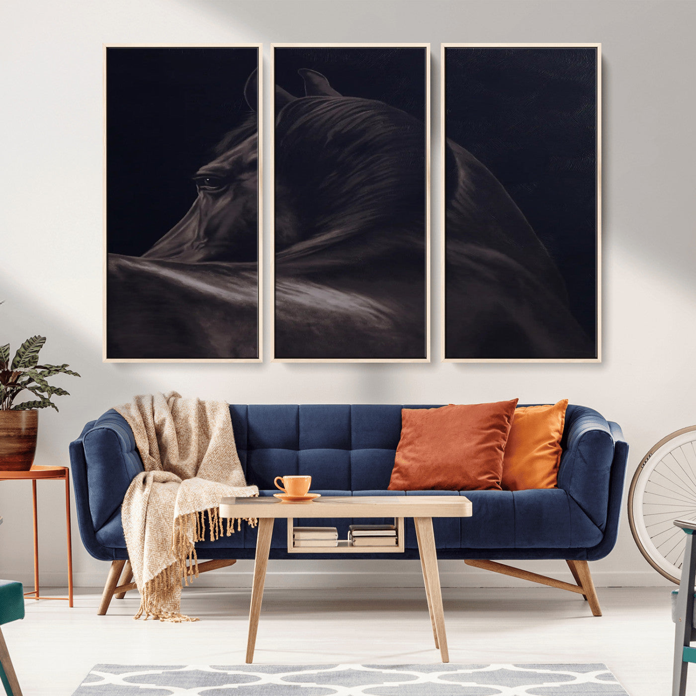 Close-up of a black horse with dramatic lighting on a dark background, perfect for rustic or masculine home decor.