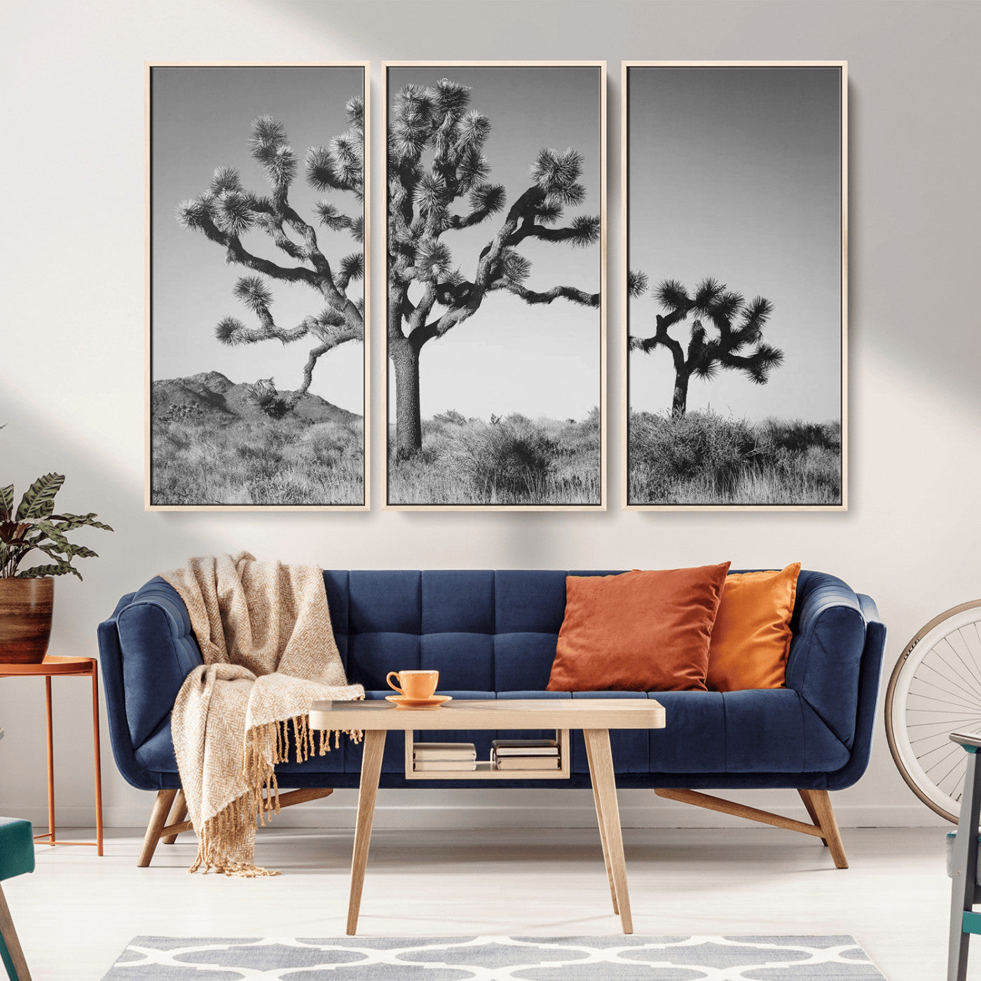Black and white Joshua trees in a rugged desert landscape, creating a calm and minimalist feel for natural or rustic-themed interiors.