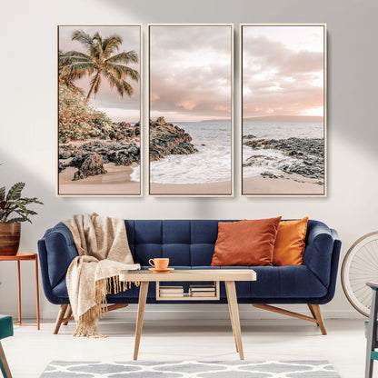 A peaceful beach scene with a palm tree and rocks, soft waves washing onto the shore under a soft pastel sky at sunset.