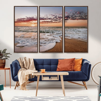 Canvas of a sunset over a foamy ocean shore with warm light and gentle waves, ideal for coastal or beach-themed home decor.