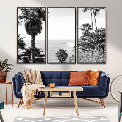 Monochrome canvas of palm trees framing a coastal surf scene, perfect for California-inspired or retro black-and-white beach decor.