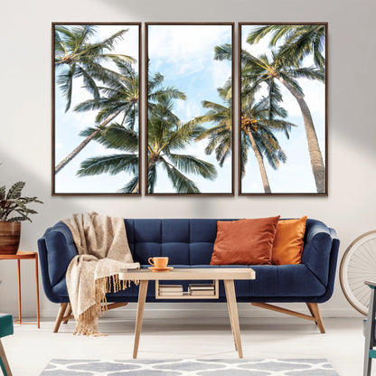 Framed canvas of tall palm trees reaching into a tropical sky, ideal for beach home or relaxed island-inspired wall decor.