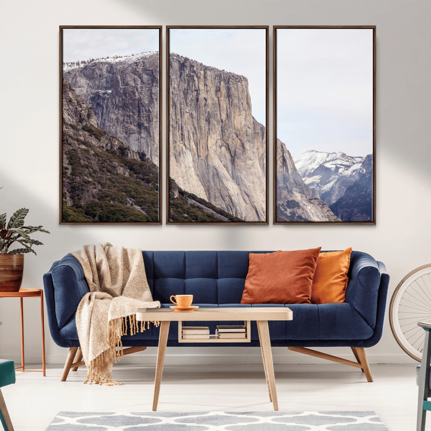 Framed canvas of El Capitan’s vertical granite face in Yosemite with snowy peaks, ideal for Sierra minimalism or mountain-inspired decor.