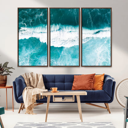 Aerial view of turquoise ocean waves crashing with white foam, perfect for tropical coastal or modern beach-style home decor.