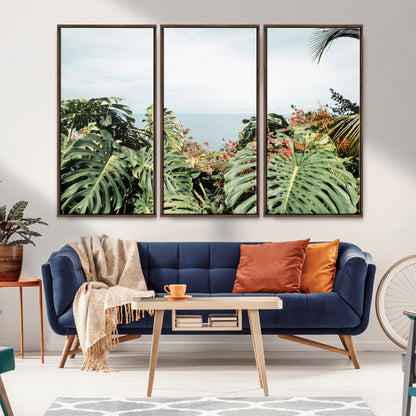 Monstera leaves and tropical flowers framing a calm ocean view, ideal for tropical coastal or exotic jungle-style interior wall decor.