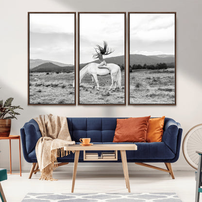 Black and white photo of a woman on a white horse in moody tones, ideal for Western Boho or modern rustic-style home decor.